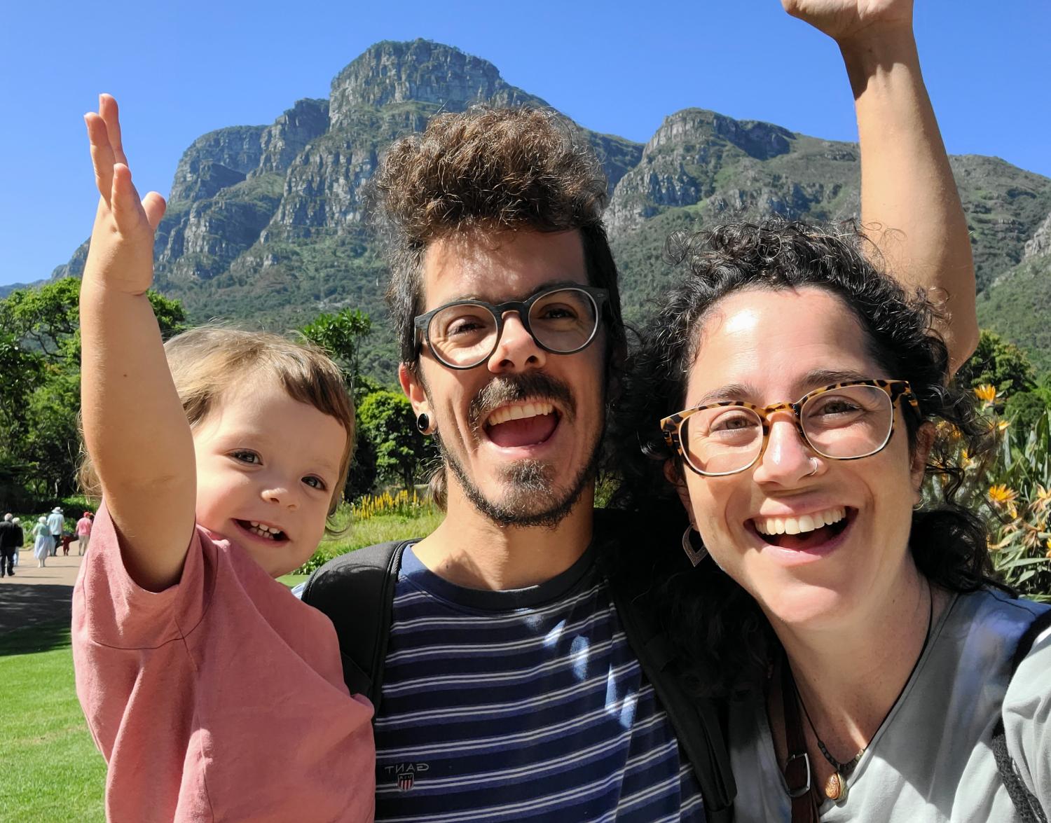 A photo of Sol, Pedro and Sel with some mountains on the background